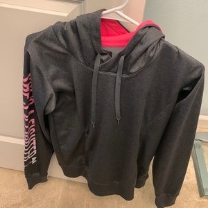 Used under armor hoodie she’s a fighter along the sleeve neon pink hood